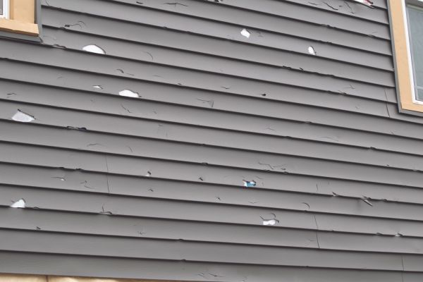 Damaged Siding Replacement in West Bend
