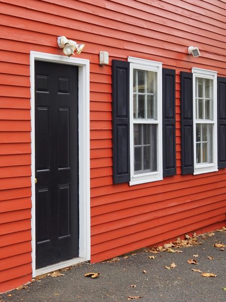 Red Vinyl Siding Installation in West Bend